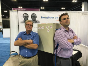 Paul (my boss) and Jim Jonas (his boss) show off the Filing Cabinet Backpack Paul and I built.